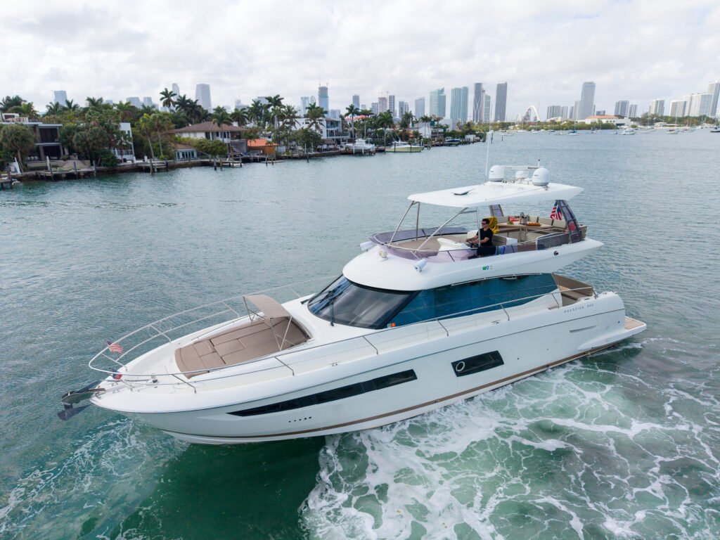 Prestige 550 luxury yacht charter cruising Biscayne Bay Miami